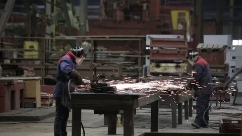 Working on the production and processing of metal in a large factory Stock Footage 73759915