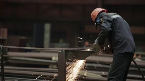 Working on the production and processing of metal in a large factory Stock Footage 73759986