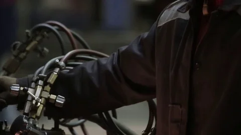 Working on the production and processing of metal in a large factory Stock Footage 73760077