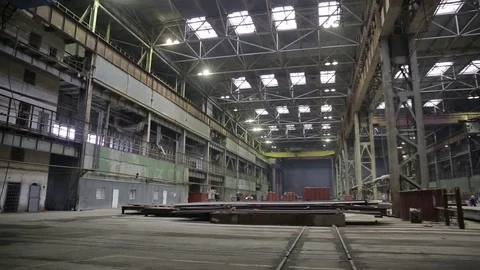 Working on the production and processing of metal in a large factory Stock Footage 73760137
