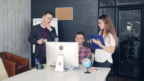 Working on project in company Stock Footage 83807036