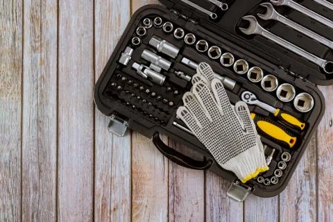 Working protective gloves tools set car mechanics wrenches equipped tool auto Stock Photos