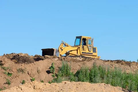 Working in a quarry tractor Stock Photos