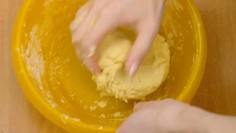 Working the raw dough for the dessert hands- making homemade cake Video stock 90418441