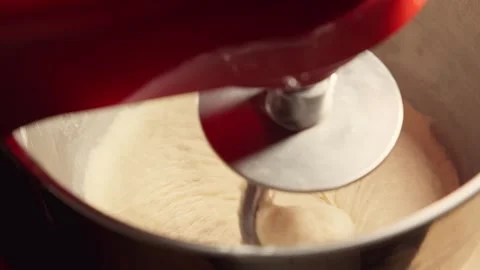 Working red stand mixer. Dough for buns or cake. Bakery concept. Stock Footage 264126771