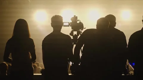 Working at the remote control at a television concert. Television filming of the Vídeo Stock 258345131