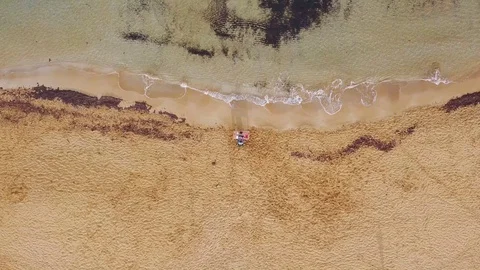 Working Remotely from Beach during Covid 19 Aerial Drone Shot Видео 128329262