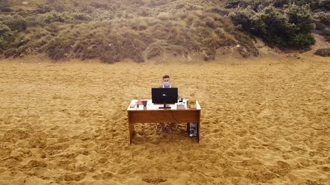 Working Remotely from Beach Home Office in Mask and Gloves Видео 128329206