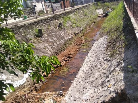Working on River Utilization Project Into a Fish Pond Stock Photos