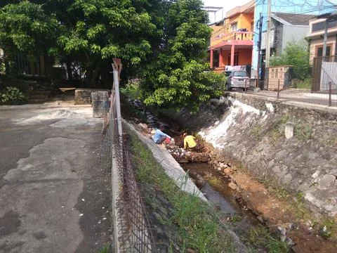 Working on River Utilization Project Into a Fish Pond Stock Photos