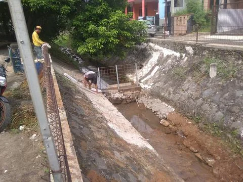 Working on River Utilization Project Into a Fish Pond Stock Photos