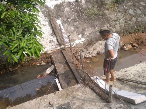 Working on River Utilization Project Into a Fish Pond Stock Photos