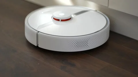 A Working Robotic Vacuum Cleaner Stock Footage 249978170