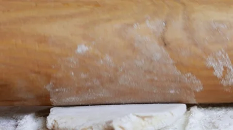 Working with a Rolling Pin on Dough Stock Footage 58689402