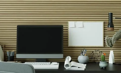 A working room with a computer placed on the table Stock Photos
