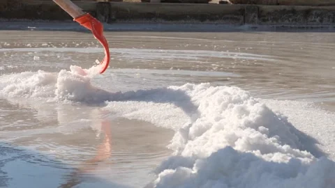 Working in the salt pond Stock Footage 294104234
