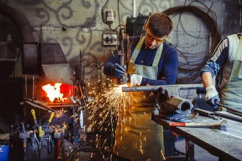 Working saws iron sparks Stock Photos