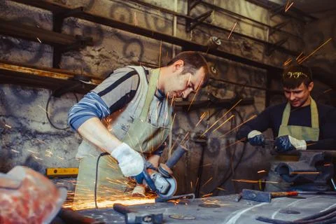 Working saws iron sparks Stock Photos