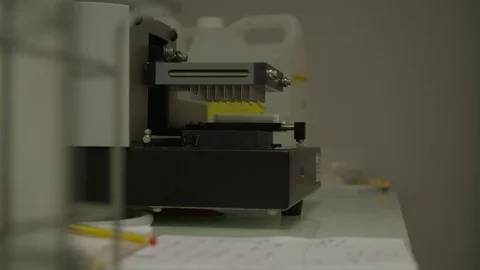Working scientist press machine in a laboratory Video stock 104247146