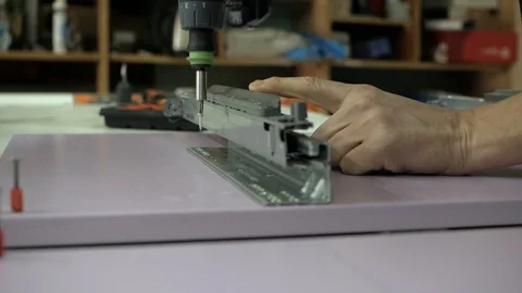 Working in the screw inserts detail Video stock 88192857
