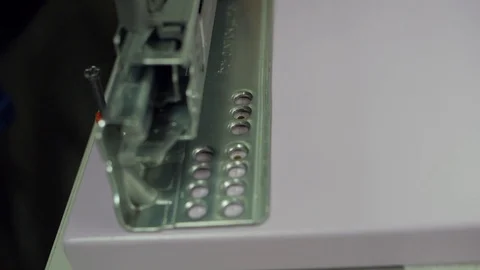 Working in the screw inserts detail Stock Footage 88193060