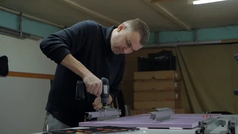 Working in the screw inserts detail Stock Footage 88257842