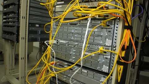 A working server rack with a large number of wires and network equipment Stock Footage 101750260