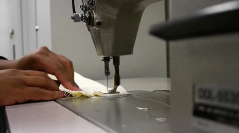 Working on Sewing machine 1 Stock Footage 22570373