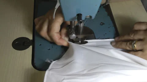 Working on a sewing machine Stock Footage 22680106