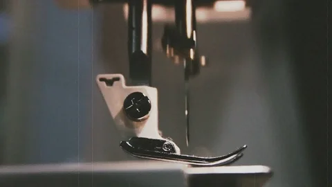 Working on the sewing machine Stock Footage 100673015
