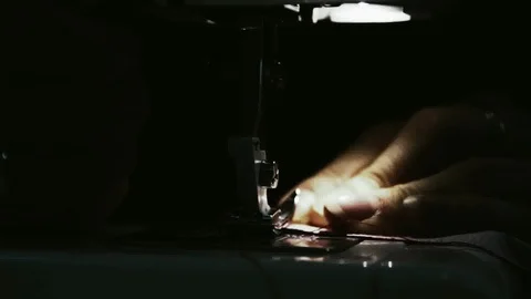 Working on the sewing machine Stock Footage 100673035