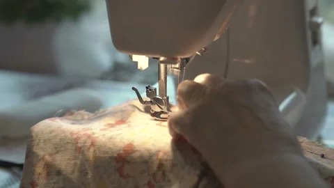 Working on sewing machine Stock Footage 113957058