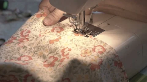 Working on sewing machine Stock Footage 113957111