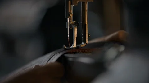 Working sewing machine presser foot, stitching in slowmotion. Tailor's hand Video stock 123013690