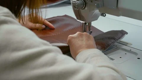 Working sewing machine stitching leather. Stock Footage 296545545