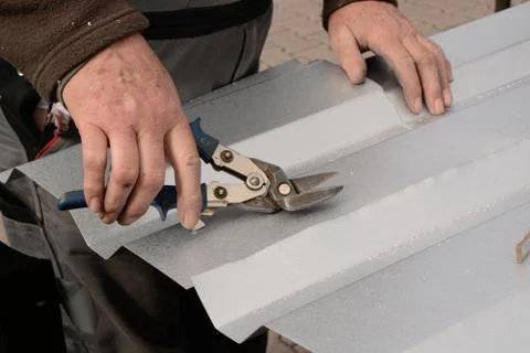 Working with sheet-iron shears Stock Photos