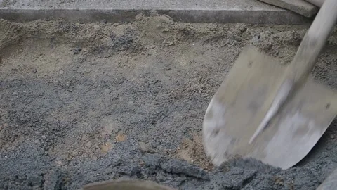 Working with a shovel on a construction site Stock Footage 337690668