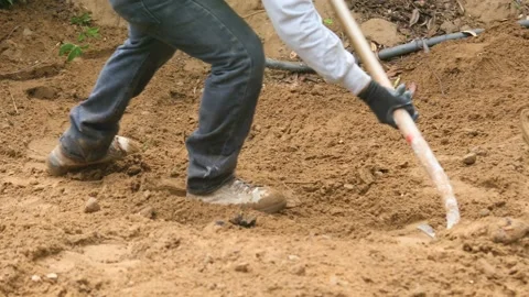 Working with a shovel MOS Stock Footage 143227174
