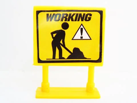 Working sign isolated on white Fotos Stock