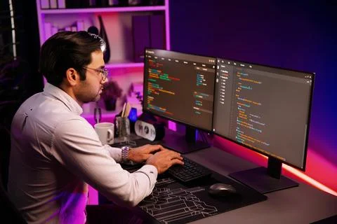 Working smart IT developer analyzing data software development on pc. Surmise. Foto stock