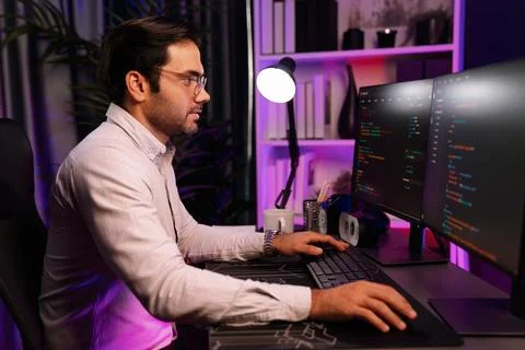 Working smart IT developer analyzing data software development on pc. Surmise. 库存照片