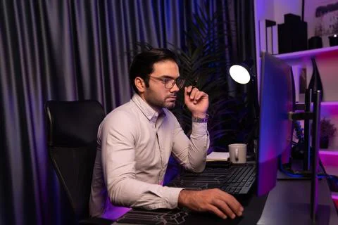 Working smart IT developer analyzing data software development on pc. Surmise. 스톡 사진