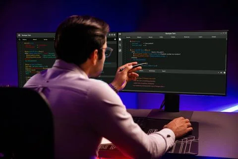 Working smart IT developer pointing data software development on pc. Surmise. 스톡 사진