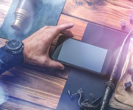 Working with a smartphone. Stock Photos