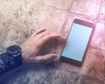 Working with a smartphone. 写真素材