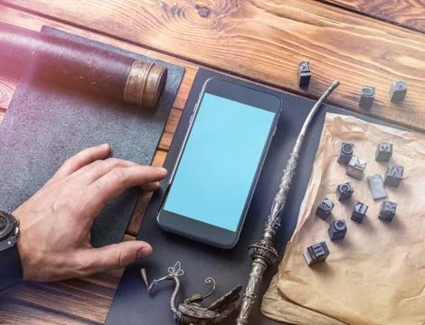 Working with a smartphone. Fotos de archivo