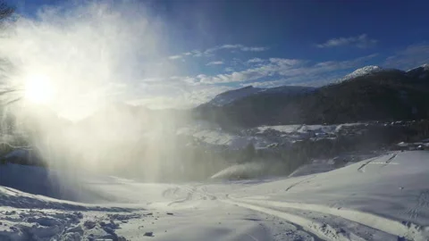 Working snow guns in front of mountain range Stock Footage 166362785