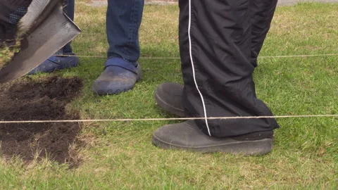 Working with soil in the garden Stock Footage 205037009