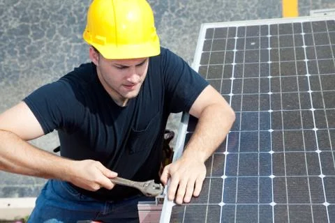 Working on Solar Panel Stock Photos