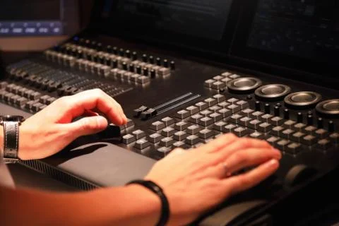 Working with stage lighting control console Stock Photos